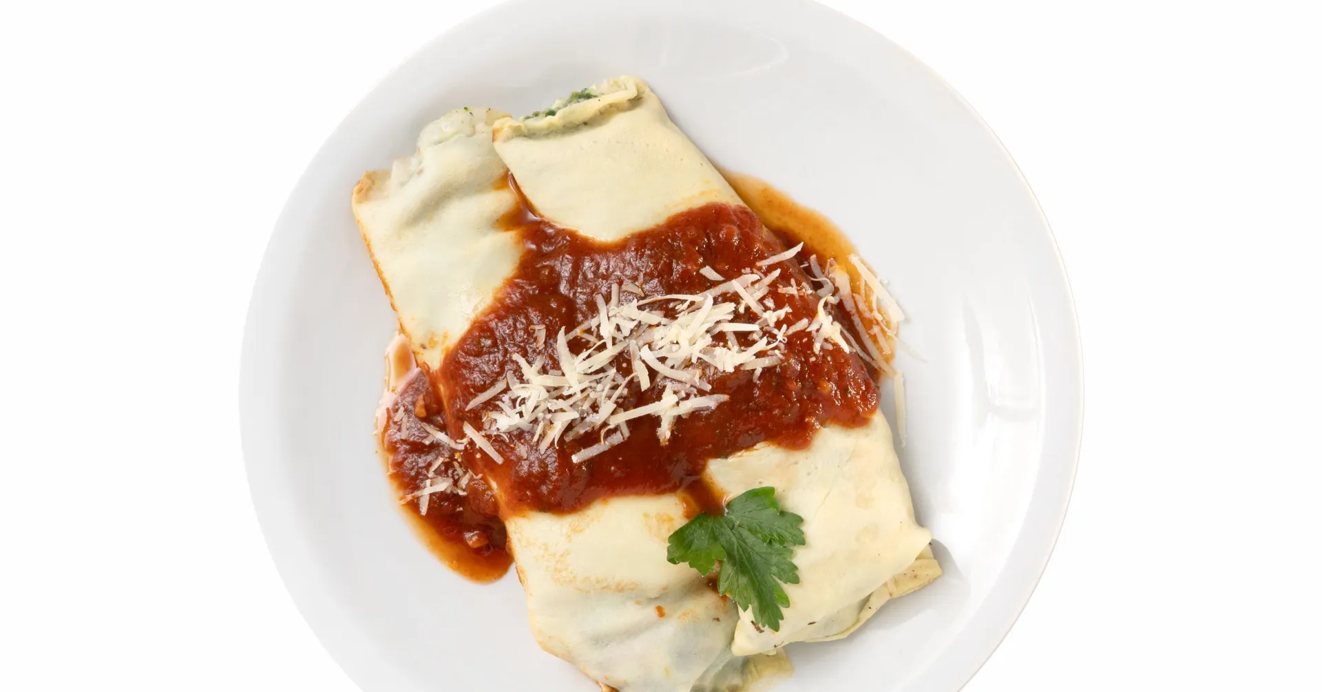 Canelones de pollo y verduras con salsa