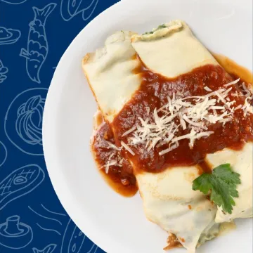 Canelones de pollo y verduras con salsa