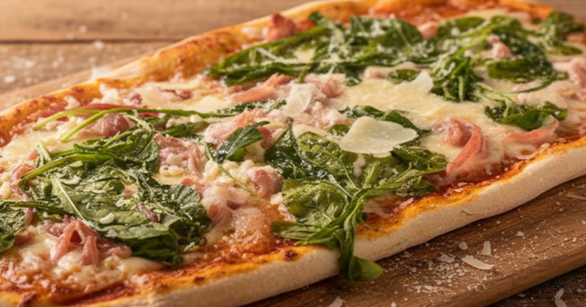 Pizza parrillera crudo y rúcula